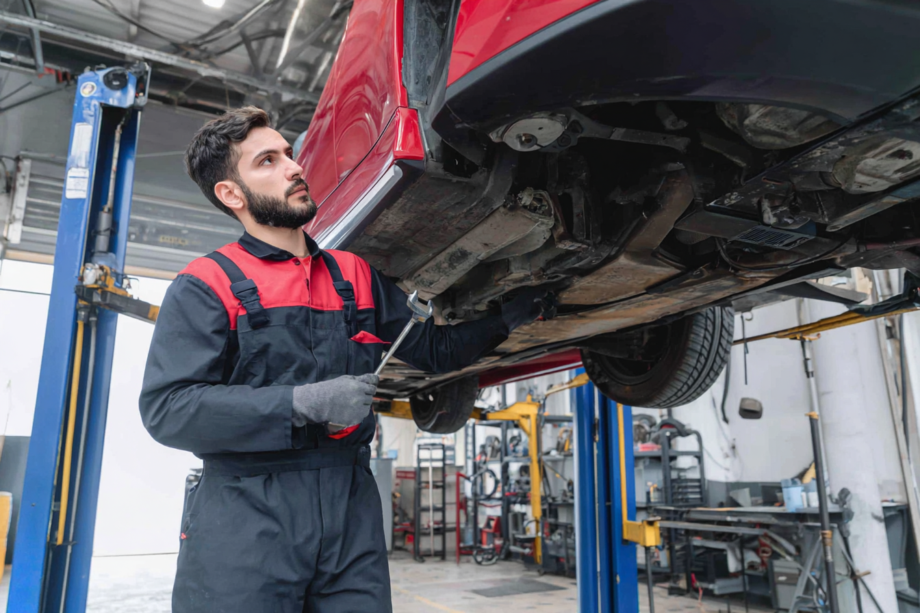 u3139919916_shot_of_a_greek_young_car_mechanic_working_on_a_c_bbe2fa67-af11-492b-8471-6498de5ab158_2